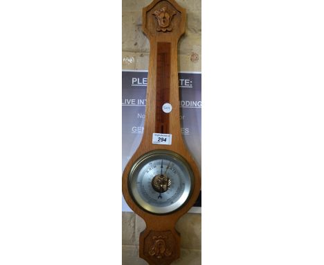 A modern oak barometer.