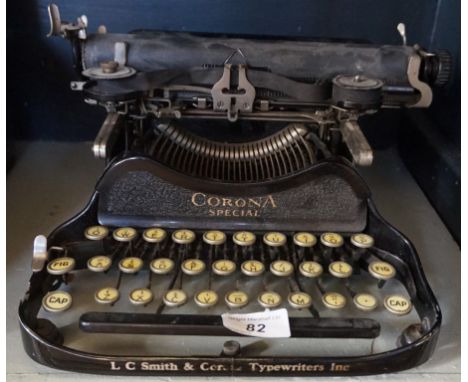 A Vintage L C Smith & Co Corona special typewriter.