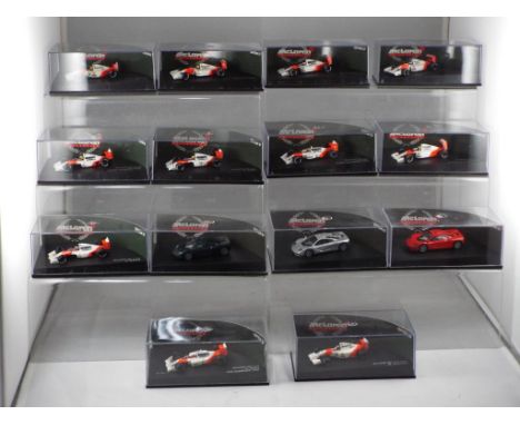 Minichamps - a collection of fourteen Minichamps 1:87 scale F1 cars with a McLaren theme, includes Edition 87 MP4/5B A.Senna 