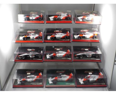 Minichamps - a collection of twelve 1:43 scale F1 cars with a McLaren theme, includes Edition 43 #24 D.Coulthard Test Car, Ed