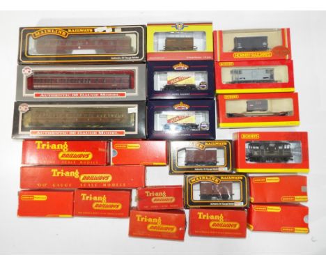 Model Railways - nineteen wagons in original boxes by Mainline, Tri-ang, Hornby and Bachmann also two coaches by Dapol and a 