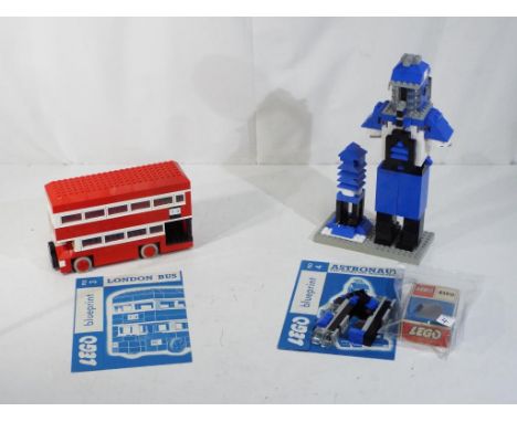 Lego - two vintage Lego model sets and blueprints to include Lego No. 3 London Bus and Lego No. 4 Astronaut plus Cosmic Gener