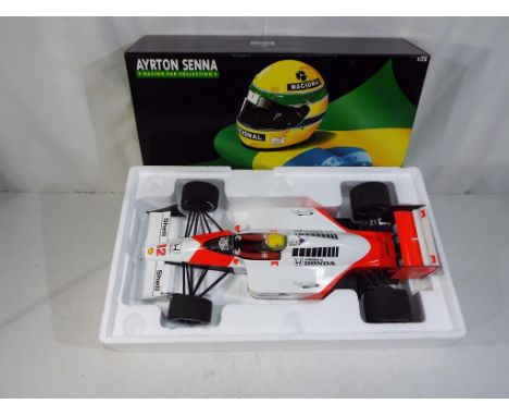 Minichamps - a 1:18 scale Ayrton Senna racing car collection by Minichamps, model number 540 88212 McLAren MP4/4 1988 World C