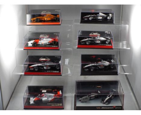 Minichamps, Hot Wheels  - a collection of eight F1 cars, predominantly 1:43 scale with a McLaren theme, includes Minichamps T