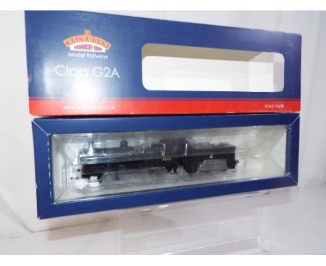 Bachmann - an OO gauge Class G2A locomotive with tender, BR black early emblem op no 49395, # 31-475, mint in original window