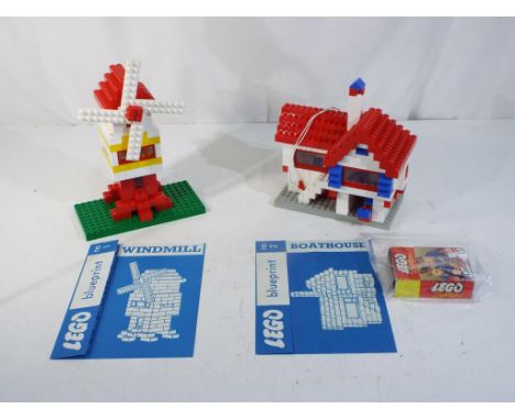 Lego - two vintage Lego model sets and blueprints to include Lego No. 1 Windmill and Lego No. 2 Boathouse, both are in near m