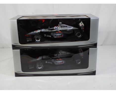 Minichamps - two 1:18 scale diecast McLaren F1 cars by Minichamps with a West Tobacco branding, includes RN7 and RN8, models 