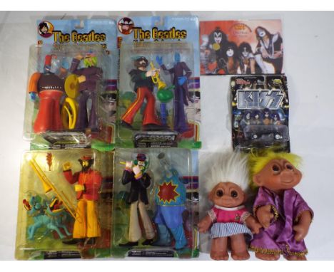 The Beatles and others - a good mixed lot to include four Beatles figures of Paul, John, George and Ringo by Spawn.com, a Kis