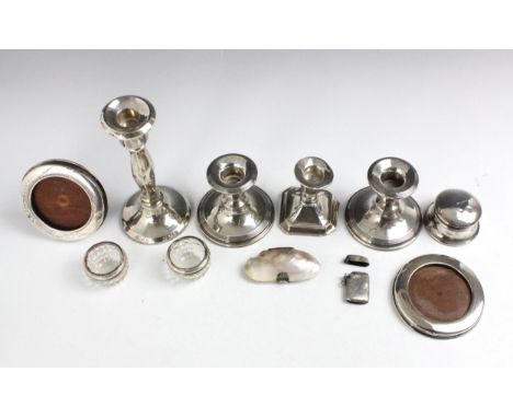 A selection of silver mounted and silver plated items, including a pair of silver mounted George V dwarf candlesticks, E F Br