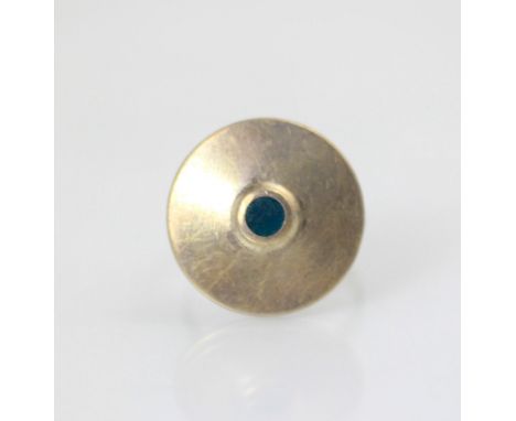 A Georg Jensen ring, the circular disc with raised teal coloured centre detail, upon plain polished shank, stamped ‘Georg Jen