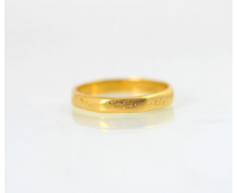 A 22ct yellow gold wedding band, of octagonal form, stamped ‘S&amp;W’ London, indistinct date letter, ring size N, 3gms 