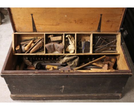 A Victorian pine joiners tool chest, the hinged cover opening to a removable tray and a collection of woodworking tools, to i