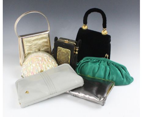A vintage black velvet evening bag, with velvet rope handle and gilt terminals, with six other evening handbags (7) 