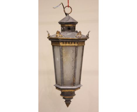 A hanging ceiling lantern, possibly Italian, early 20th century, highlighted with gilt detail, of tapering hexagonal form wit