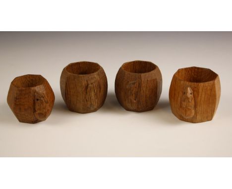 Workshop of Robert 'Mouseman' Thompson of Kilburn, a pair of shaped octagonal napkin rings, each with carved trademark mouse,