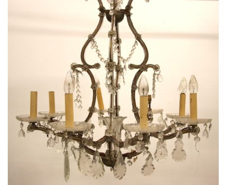 An Italian cut glass eight branch chandelier of large proportions, in the 19th century Venetian manner, the central column fo