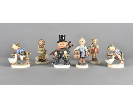 A collection of six Goebel Hummel figures, including Boots, Goose Girl etc 