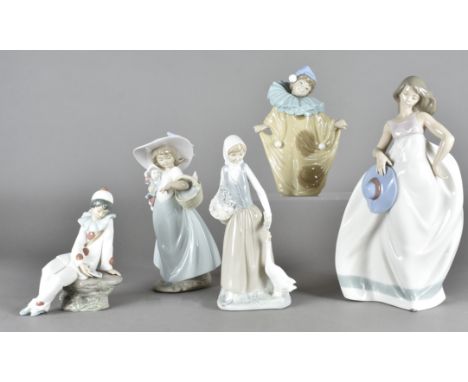 A collection of Nao figures, modelled as a clown, girl with bonnet, seated boy etc  