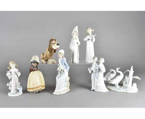 A collection of Lladro porcelain and stoneware figures, including a stoneware bisque example of a young girl with hands held 
