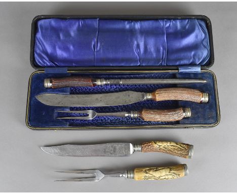 A cased antler handled carving set, with Sheffield steel Cavendish blade together with another pair with Sollingen silver pla