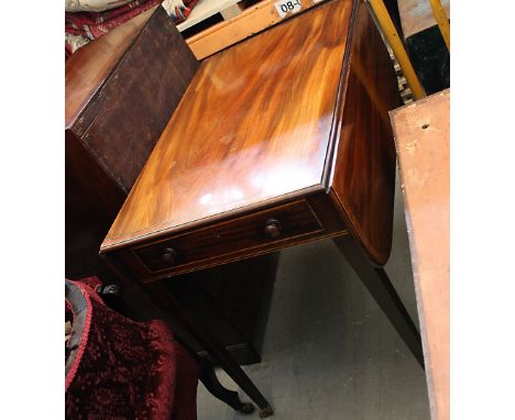 A 19th Century mahogany and strung sofa table,  on slender tapering legs with casters, single drawer and dummy 