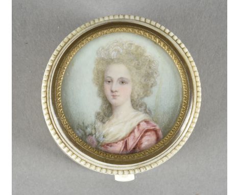 A 19th Century ivory hinged box, with portrait miniature of elegant woman to lid, 3.2 cm high x 4.4 cm diameter 