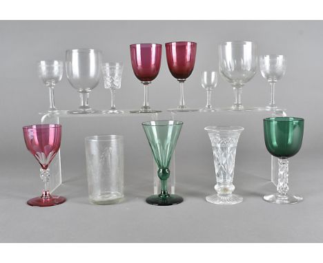 A collection of 19th Century and later drinking glasses, including a toasting glass, three cranberry examples and others (par