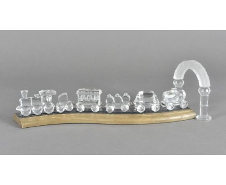 A Swarovski glass train set and stand, with tunnelThis lot does not include box or certificate. Overall in good-very good con