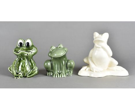 A Beswick pottery model of a seated toad, no 368, together with a Sylvac frog money box and a Wade frog money box 