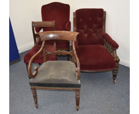 A Victorian stained beech armchair, with button back upholstery, turned supports on ceramic castors, together with another up