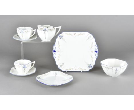 A Shelley Queen Anne shape Iris pattern tea service, comprising nine cups, milk jug, sugar bowl, twelve saucers, eleven side 