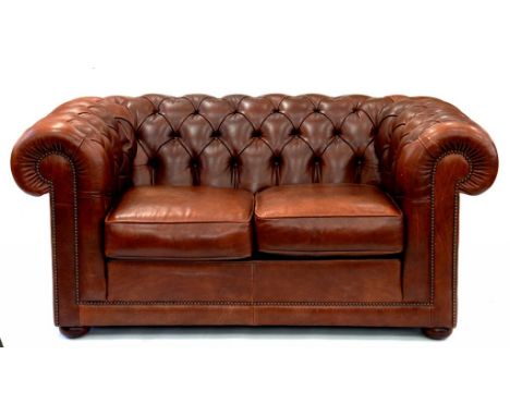 A VICTORIAN STYLE BUTTONED BROWN HIDE CHESTERFIELD SOFA, 155CM W