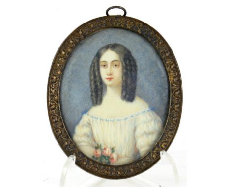 A PORTRAIT OF MINIATURE OF A LADY IN A WHITE DRESS HOLDING ROSES IN HER HAND, SIGNED 'PETERS', IVORY, OVAL, 7 X 5.5CM, BRASS 