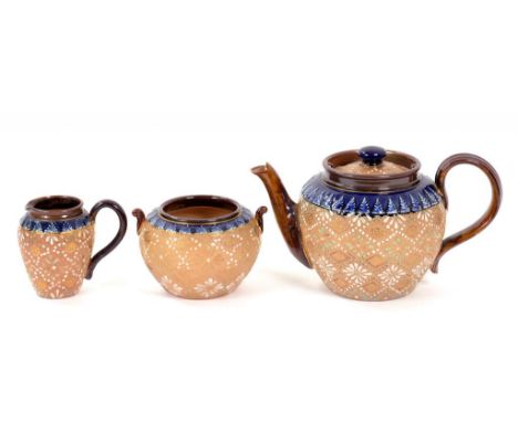 A DOULTON WARE THREE PIECE TEA SET, TEAPOT AND COVER 13CM H, C1910