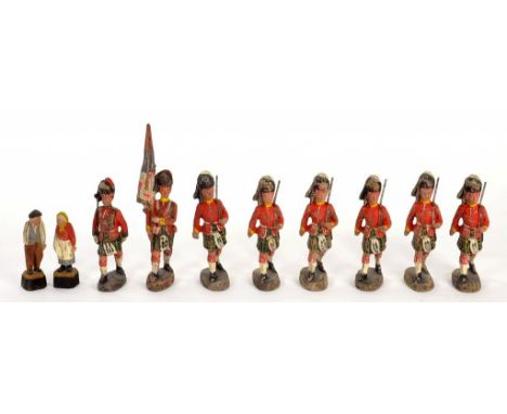A BOXED CHAD VALLEY CARDBOARD TAKE TO PIECES MODEL OF THE RMS QUEEN MARY AND A SET OF EIGHT ELASTOLENE PAINTED FIGURES OF HIG
