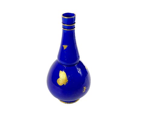 A Minton aesthetic movement baluster vase. Dated 1873, the cobalt blue ground decorated in gilt with butterflies, dragonflies