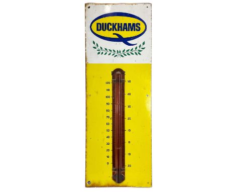 Motoring Interest- An enamel Duckhams sign with thermometer. With wreath motif, height 92cm.