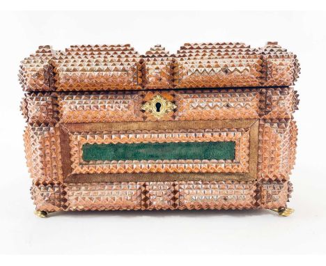 A tramp art velvet lined box or casket. With gilt handle and paw feet, height 18cm, width 28.5cm, depth 19cm.A small loss on 