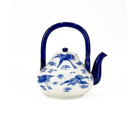 Christopher Dresser for Minton, a crane pattern teapot and cover. Circa 1890, of Japanesque design, with blue painted overhea