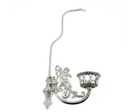A Romany carriage chrome plated wall lamp. Early 20th century, with swivel fitting and cast with a trumpeting angel, overall 