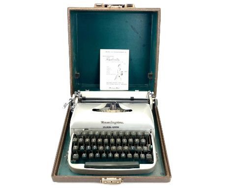 A Remington Travel-Riter circa 1950s. With manual and spare ribbon and in the original travel case.