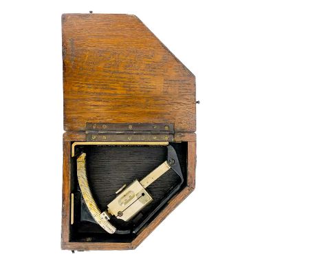 A WWII era gunners Clinometer Field Mark VI. In oak case.