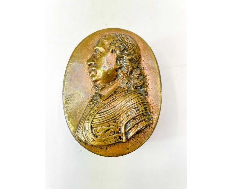 A 19th century oval table snuff box embossed with a profile portrait of Cromwell. Height 5.5cm width 10cm depth 7.5cm.There a