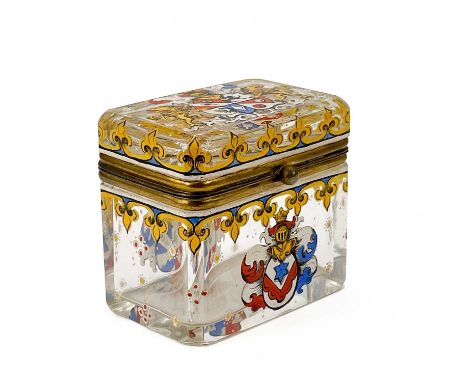 A Continental enamelled glass casket. 19th century, of hinged rectangular form with gilt metal mounts, polychrome enamel armo