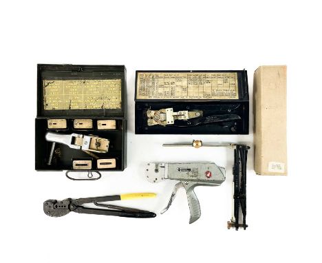 A Lucas crimping tool kit. Together with other vintage crimping tools and a tangent Clinometer.
