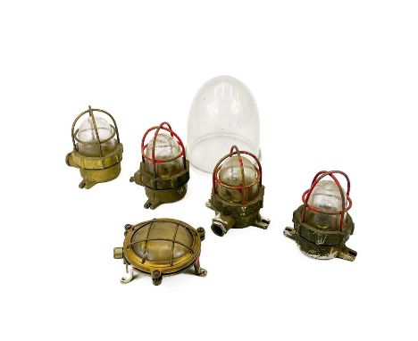 Five brass marine bulkhead light fittings. Height 14cm together with a glass dome.