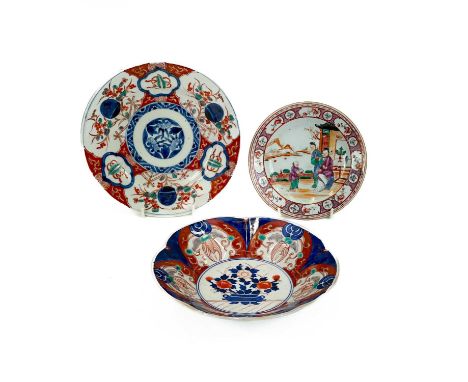 A Chinese polychrome tea plate. Painted with figures, diameter 16cm, together with a Japanese imari bowl and an imari plate (