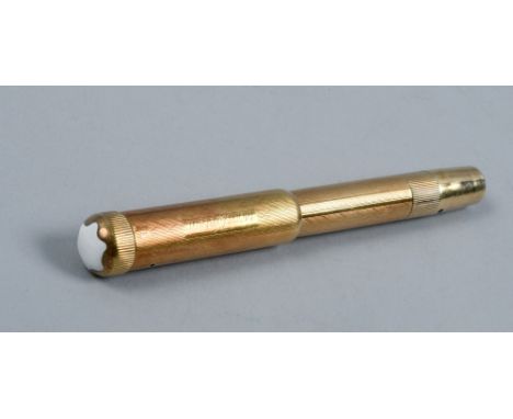 A Mont Blanc .585 gold dip pen with retractable nib, engraved barrel and cover, 4in l closed.