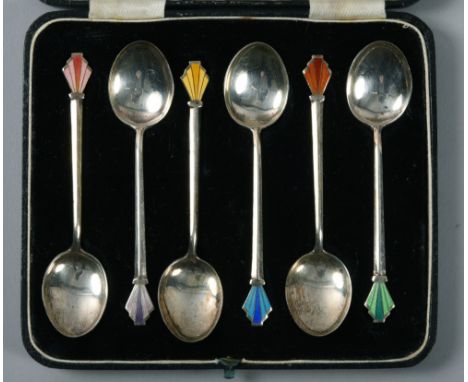A boxed set of six silver coffee spoons with Art Deco style enamel terminals, makers mark for william Hair Haseler, Birmingha