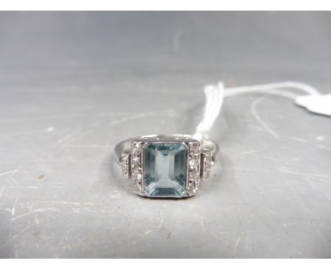 An 18ct white gold aquamarine and diamond set ring.
